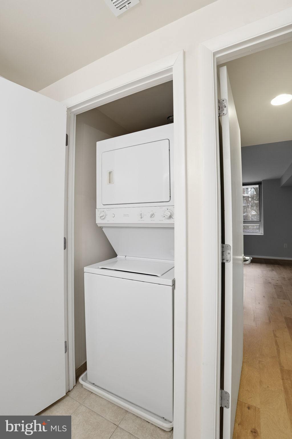 350 G Street Southwest, Unit N302 Washington, DC 20024 - Photo 13 of 32 a utility room with dryer and washer