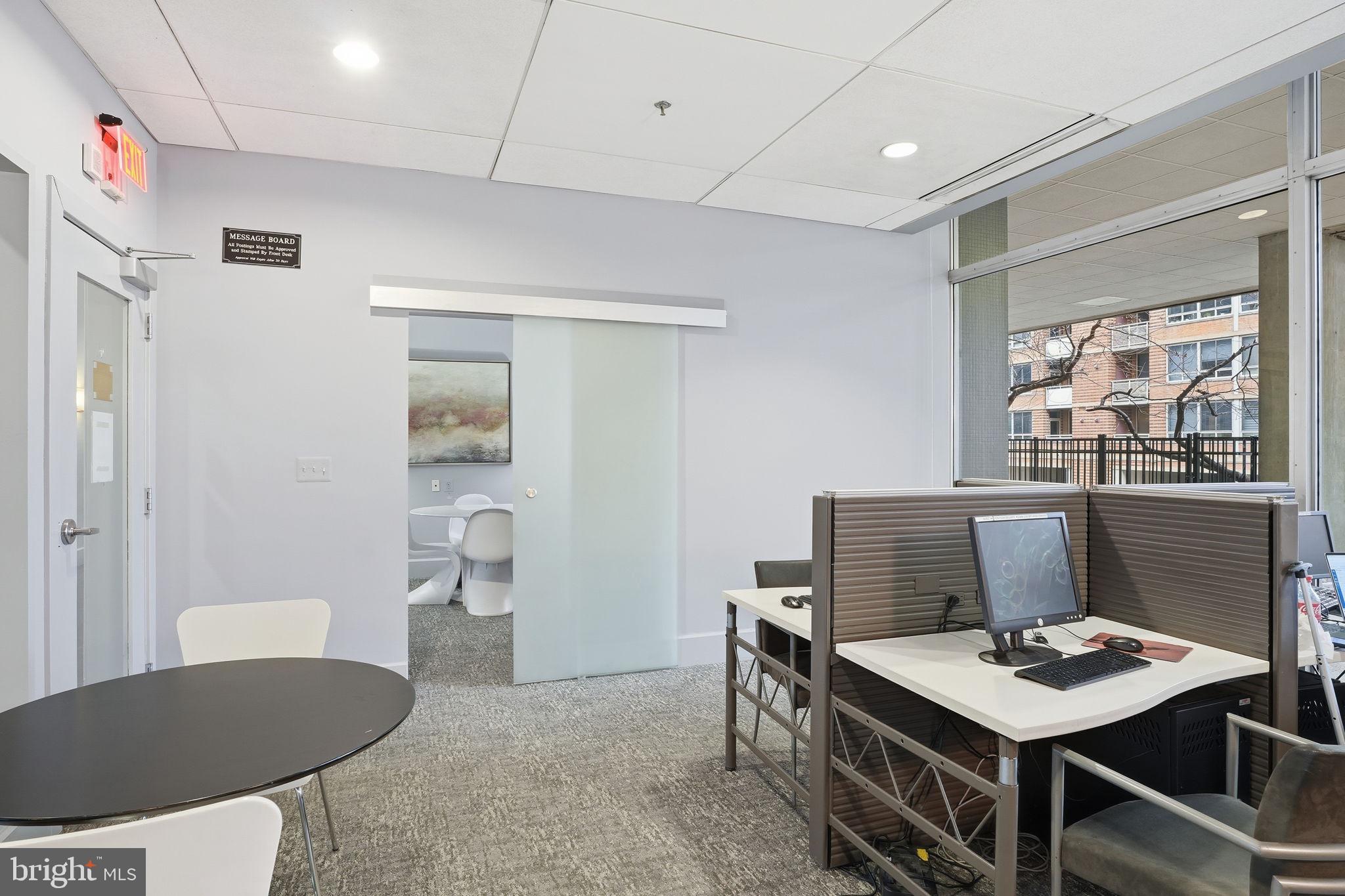 350 G Street Southwest, Unit N302 Washington, DC 20024 - Photo 20 of 32 a workspace with furniture and window