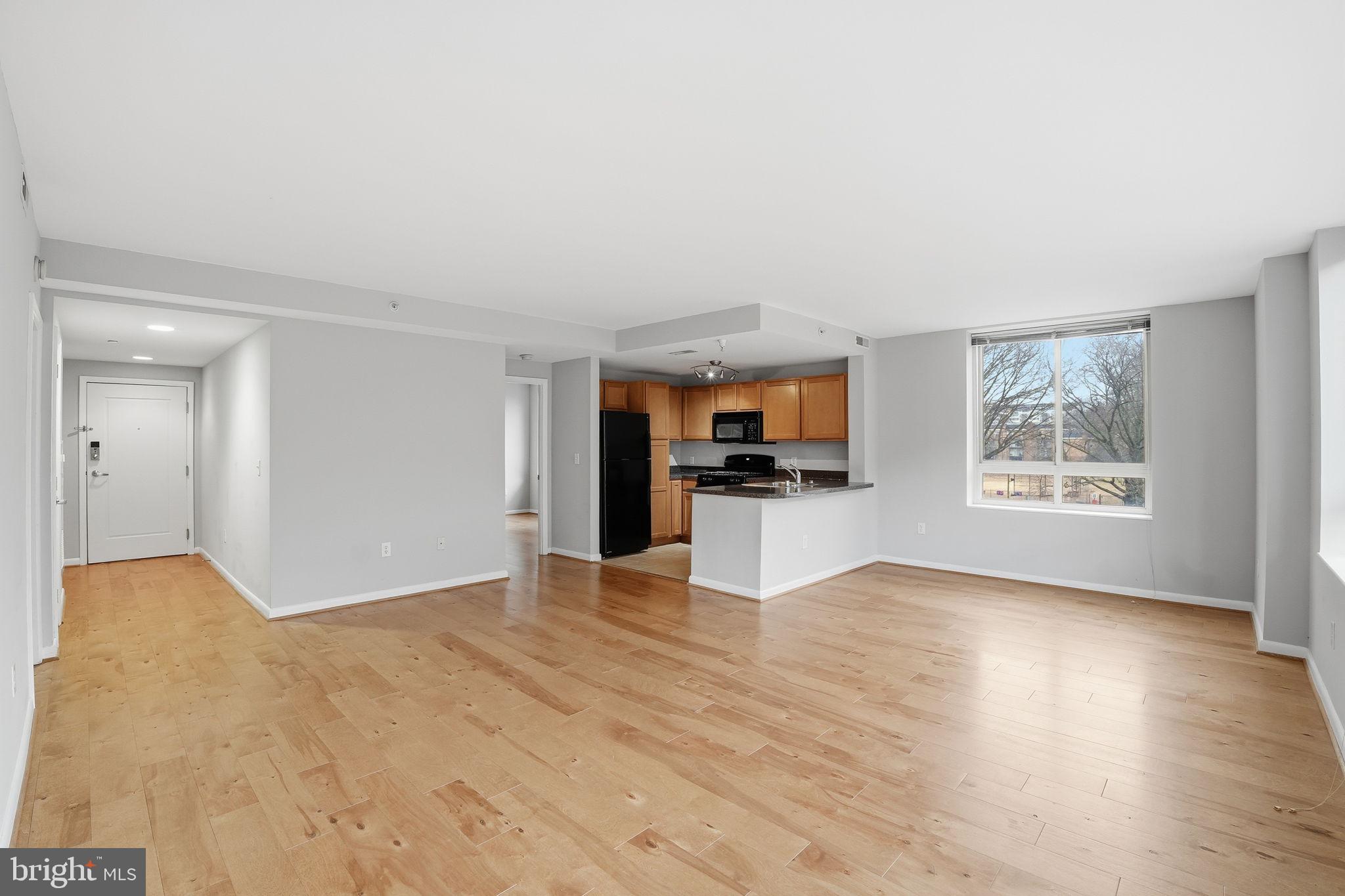 350 G Street Southwest, Unit N302 Washington, DC 20024 - Photo 30 of 32 a view of kitchen with microwave and cabinets