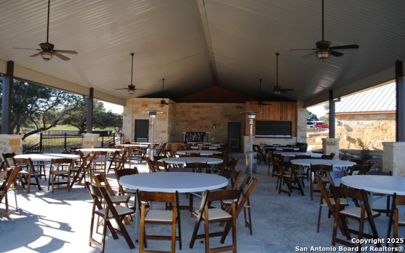 Lot 371 West Nicholas Weeks Blanco, TX 78606 - Photo 15 of 18 a view of a dining room with furniture window and outside view