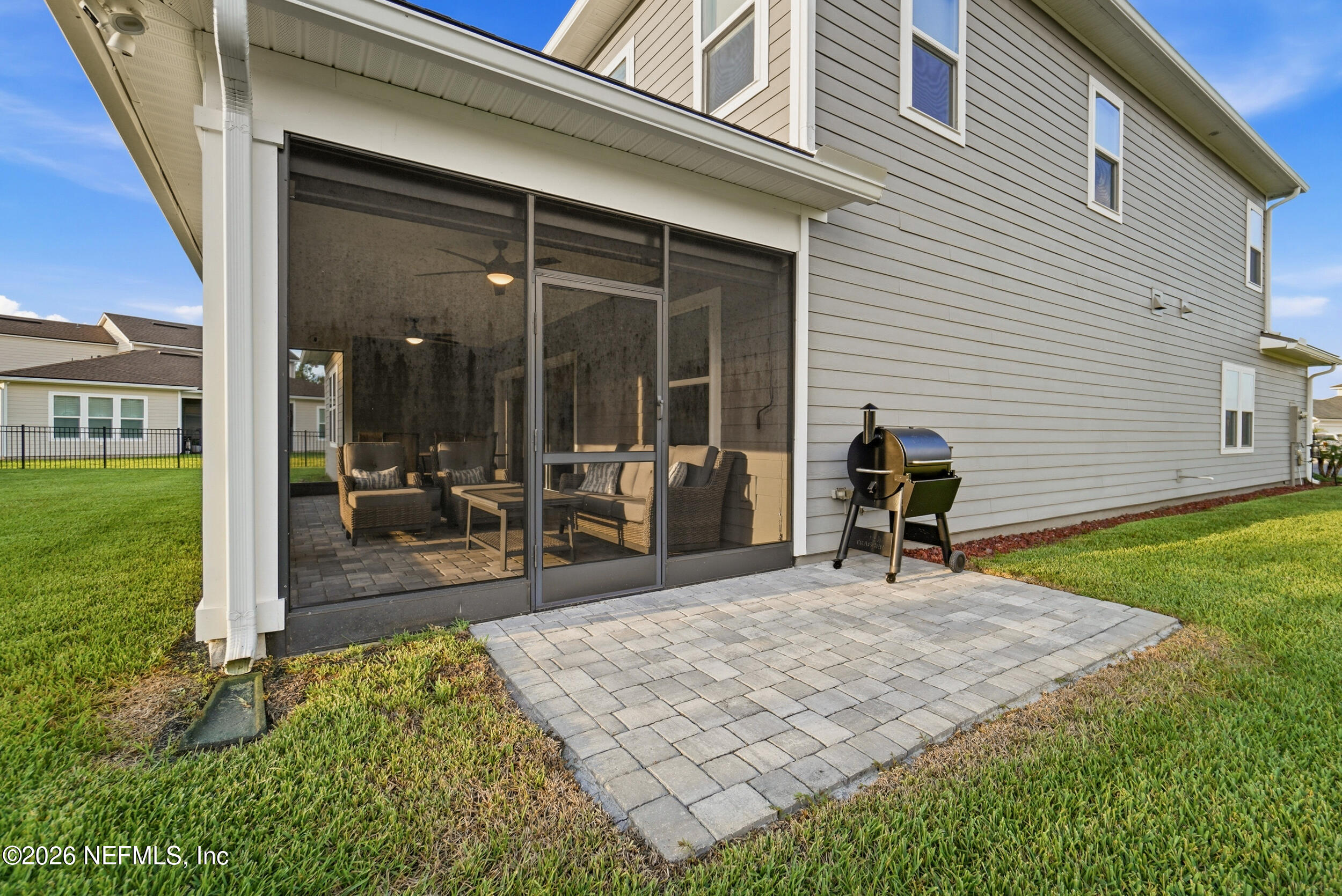 34 Red Rock Lane St. Johns, FL 32259 - Photo 52 of 71 a view of a backyard with a patio and a garden