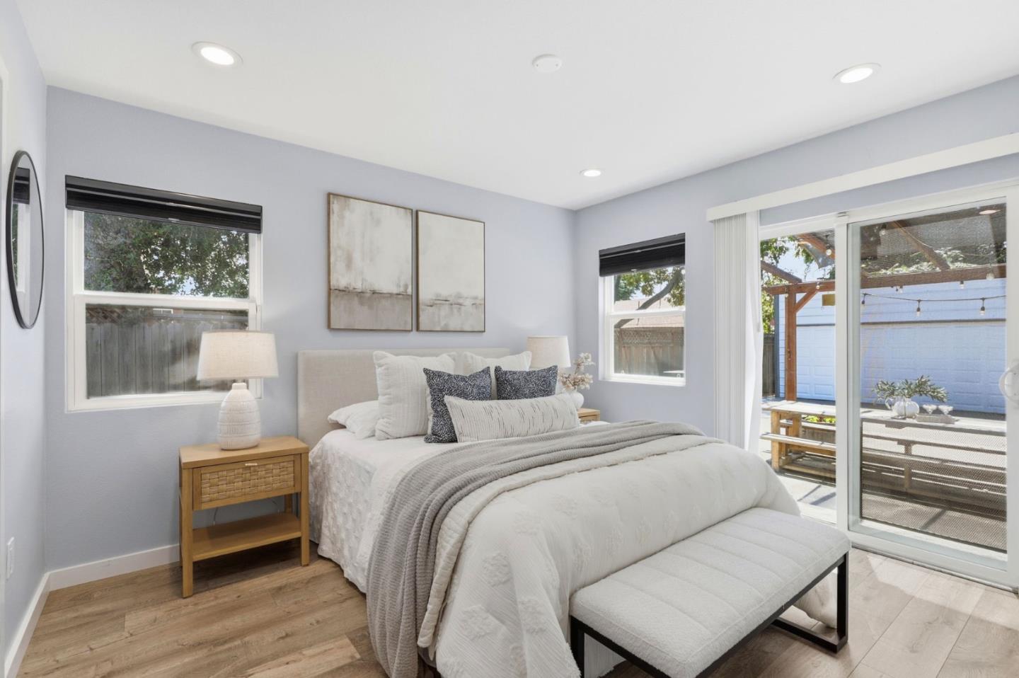 140 Second Street Gilroy, CA 95020 - Photo 21 of 33 a bedroom with a bed and wooden floor