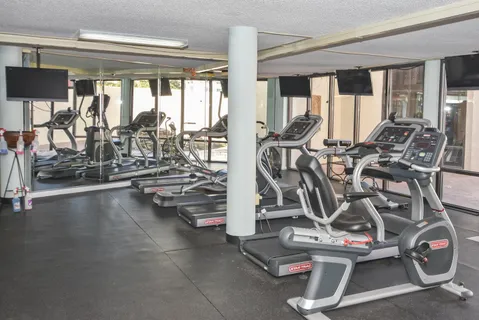 a view of a room with gym equipment