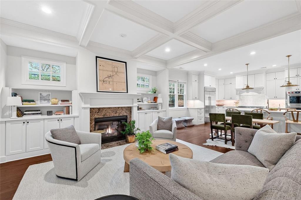 101 Walden Square Way Decatur, GA 30030 - Photo 11 of 33 a living room with furniture fireplace and a large window