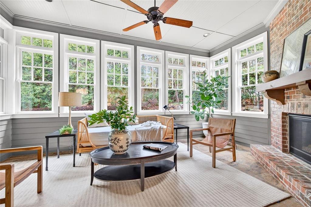 101 Walden Square Way Decatur, GA 30030 - Photo 13 of 33 a living room with fireplace furniture and a large window