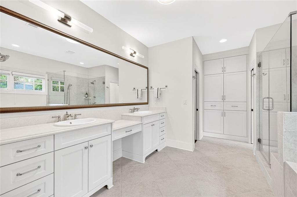 101 Walden Square Way Decatur, GA 30030 - Photo 24 of 33 a spacious bathroom with a double vanity sink mirror and double