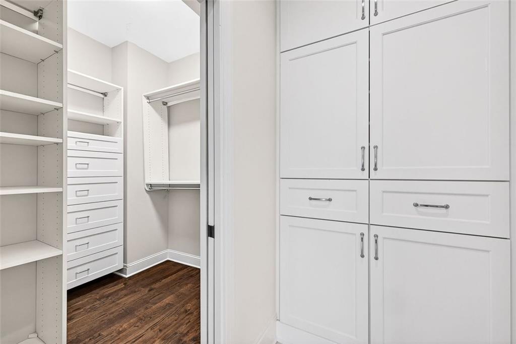 101 Walden Square Way Decatur, GA 30030 - Photo 27 of 33 a view of walk in closet with empty racks