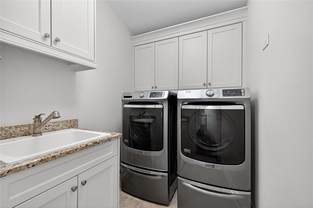 101 Walden Square Way Decatur, GA 30030 - Photo 28 of 33 a utility room with dryer and washer