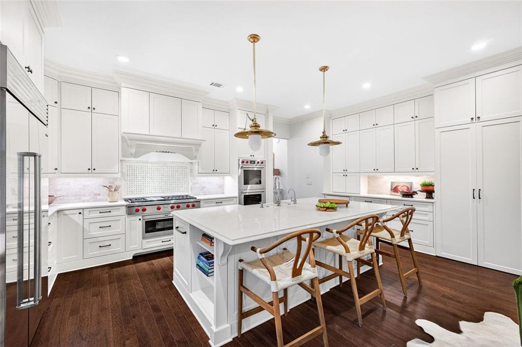 101 Walden Square Way Decatur, GA 30030 - Photo 4 of 33 a kitchen with a stove a sink and a refrigerator