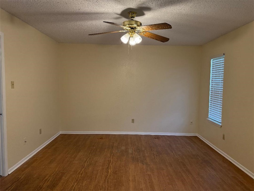 110 Timberview Drive Portland, TX 78374 - Photo 16 of 30 an empty room with a window and a fan