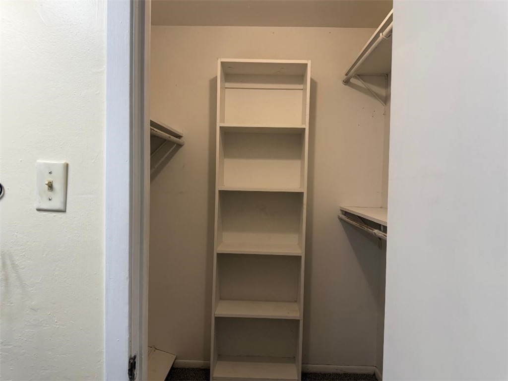 110 Timberview Drive Portland, TX 78374 - Photo 20 of 30 a view of walk in closet with empty racks
