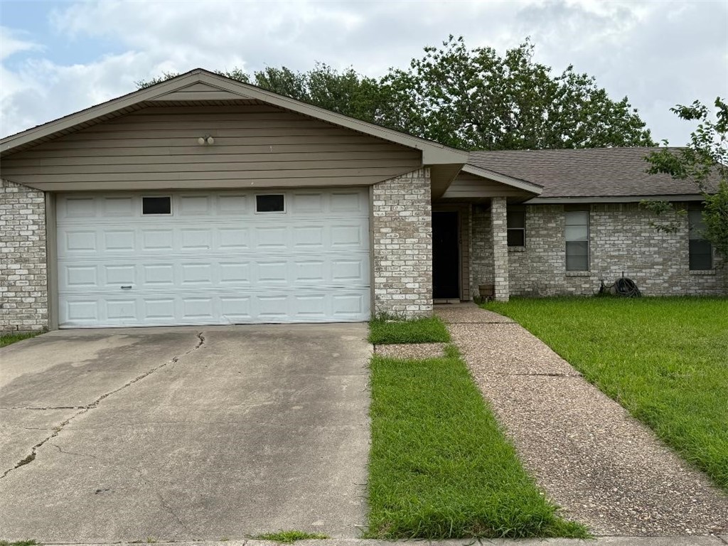 110 Timberview Drive Portland, TX 78374 - Photo 29 of 30 front view of a house with a yard