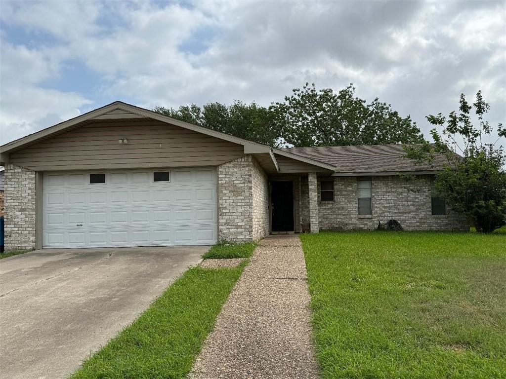 110 Timberview Drive Portland, TX 78374 - Photo 30 of 30 a front view of a house with a garden