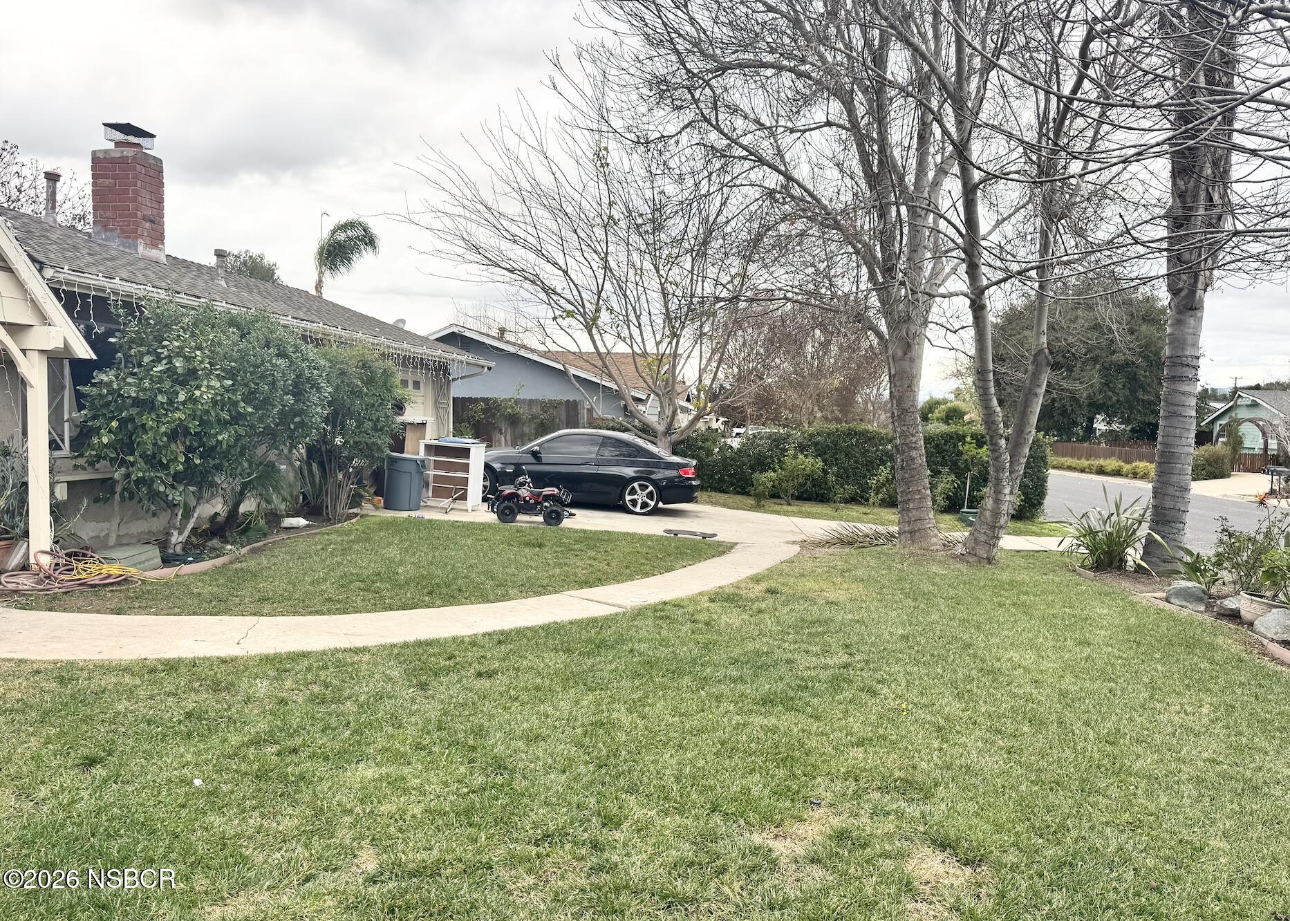 348 Kendale Road Buellton, CA 93427 - Photo 5 of 9 a view of yard with swimming pool and trees