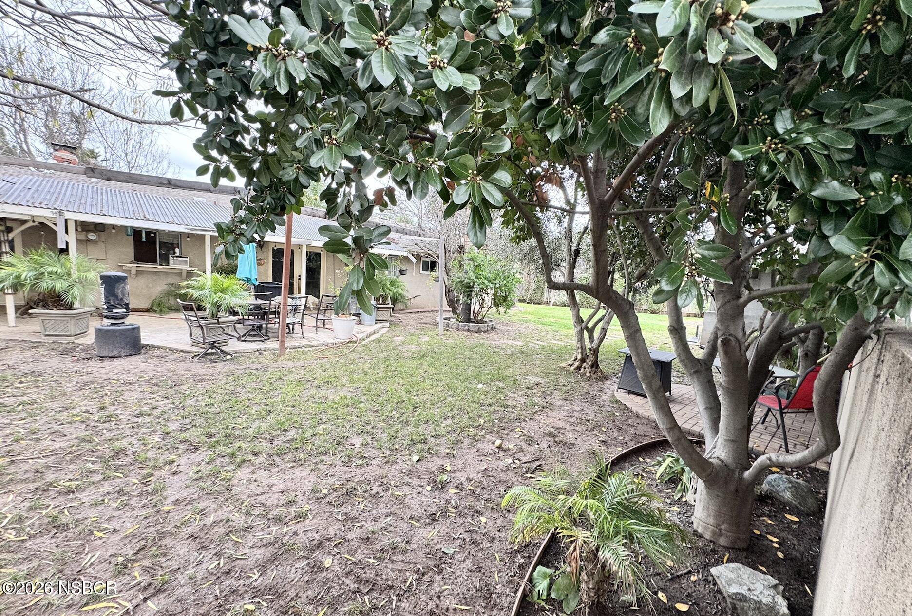 348 Kendale Road Buellton, CA 93427 - Photo 7 of 9 a view of a house with backyard and sitting area