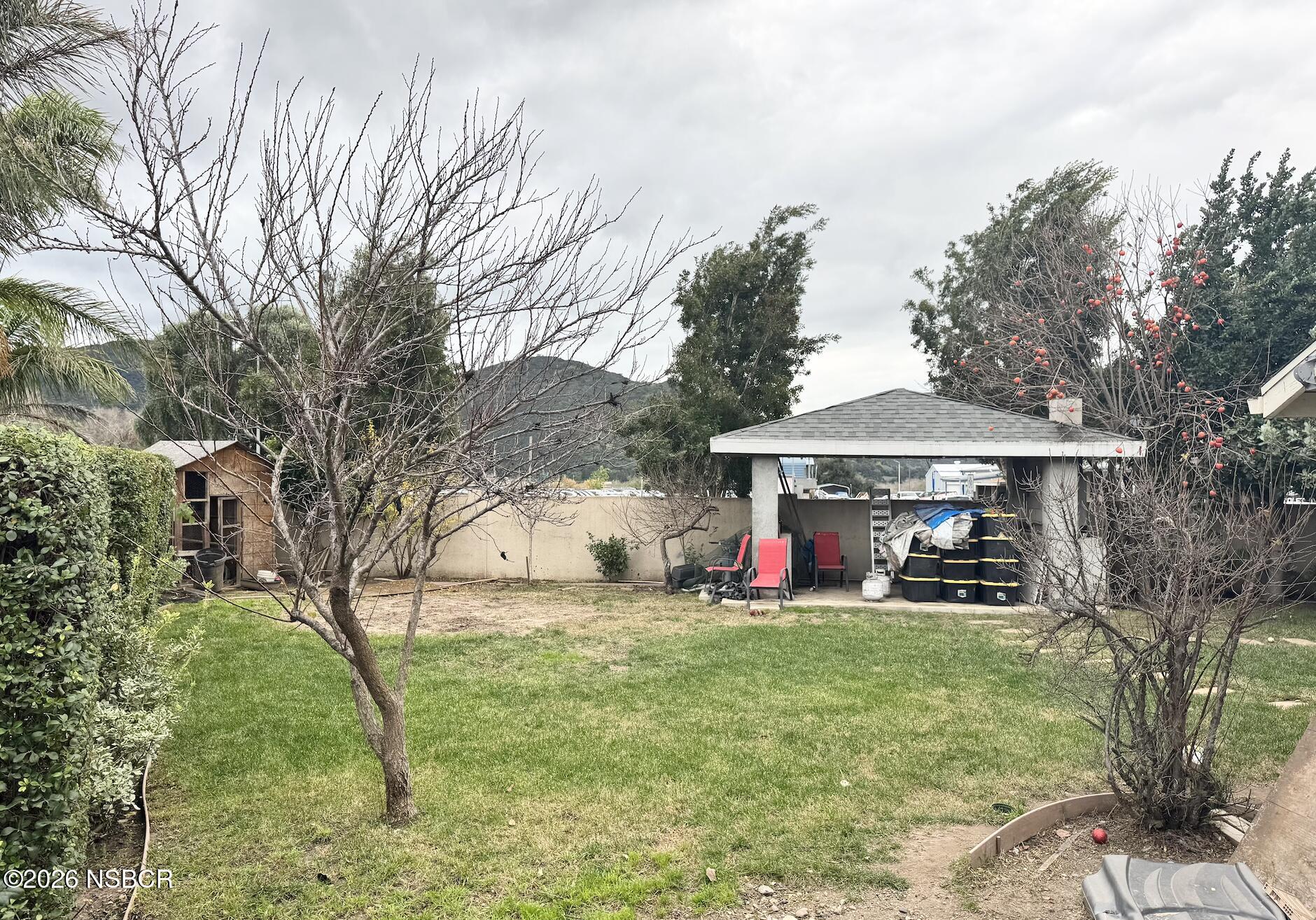 348 Kendale Road Buellton, CA 93427 - Photo 8 of 9 a view of outdoor space with garden and trees