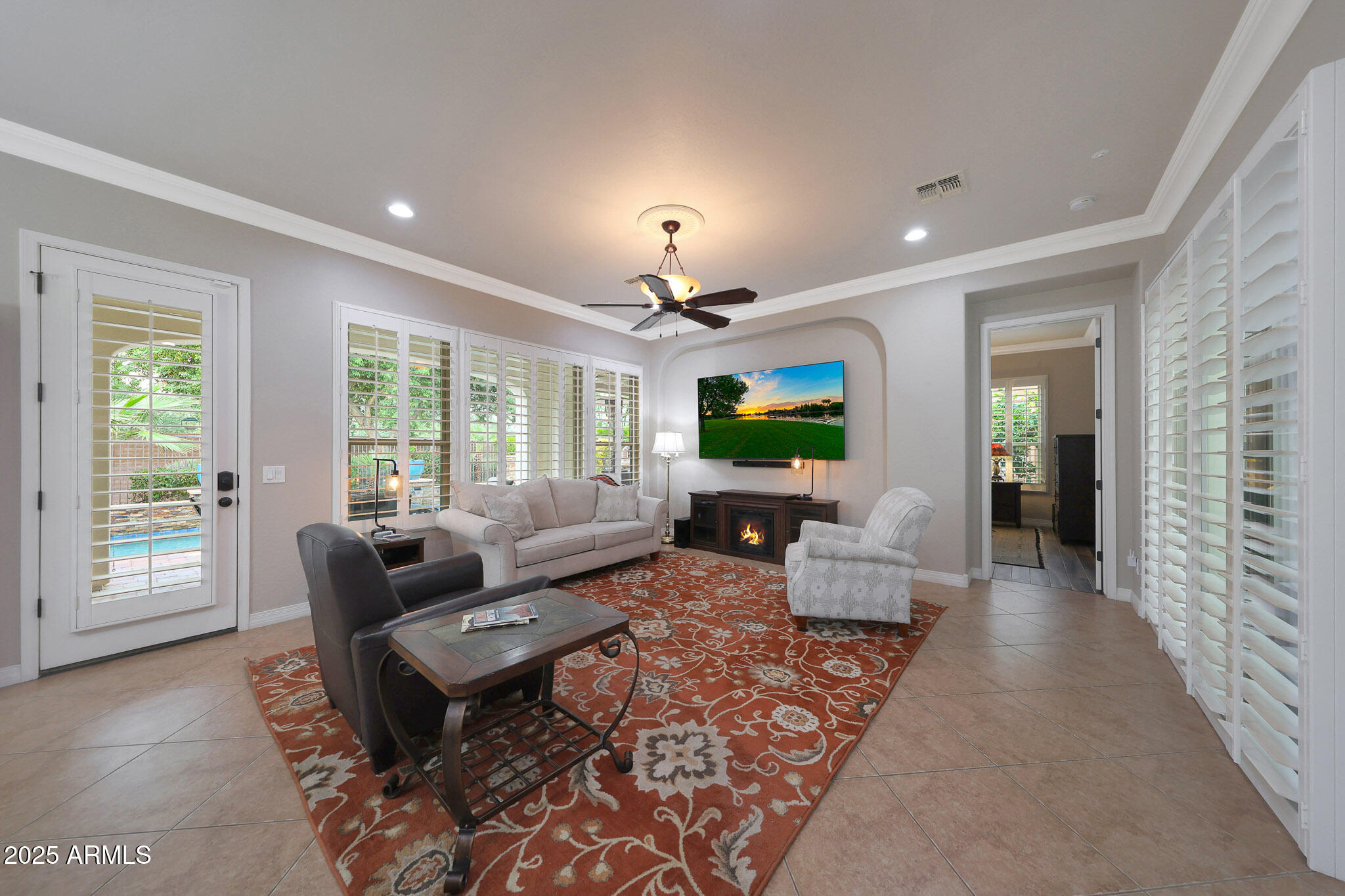 12920 West Roy Rogers Road Peoria, AZ 85383 - Photo 22 of 85 a living room with furniture and a wooden floor
