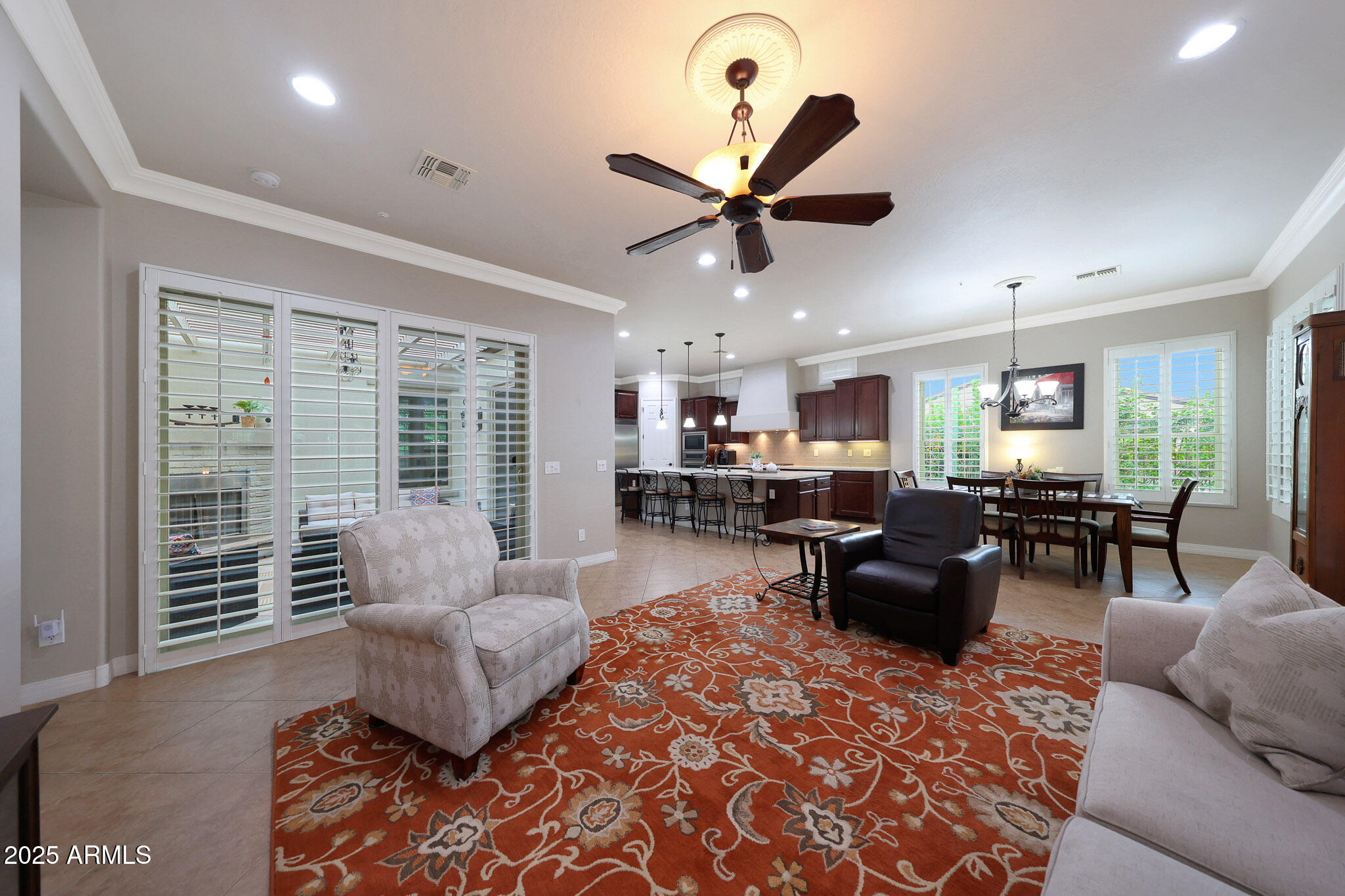 12920 West Roy Rogers Road Peoria, AZ 85383 - Photo 23 of 85 a living room with furniture and a large window