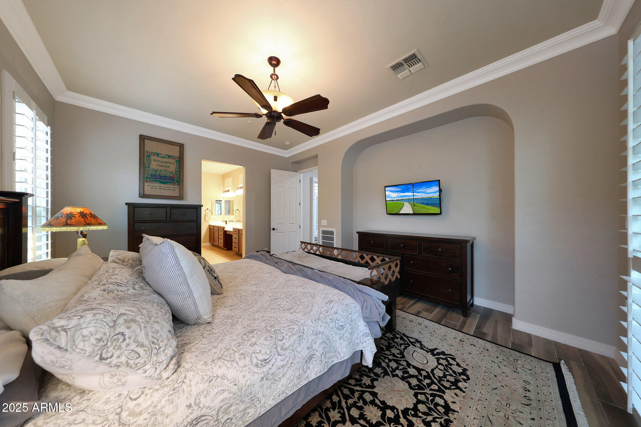 12920 West Roy Rogers Road Peoria, AZ 85383 - Photo 30 of 85 a bedroom with a bed and a chandelier