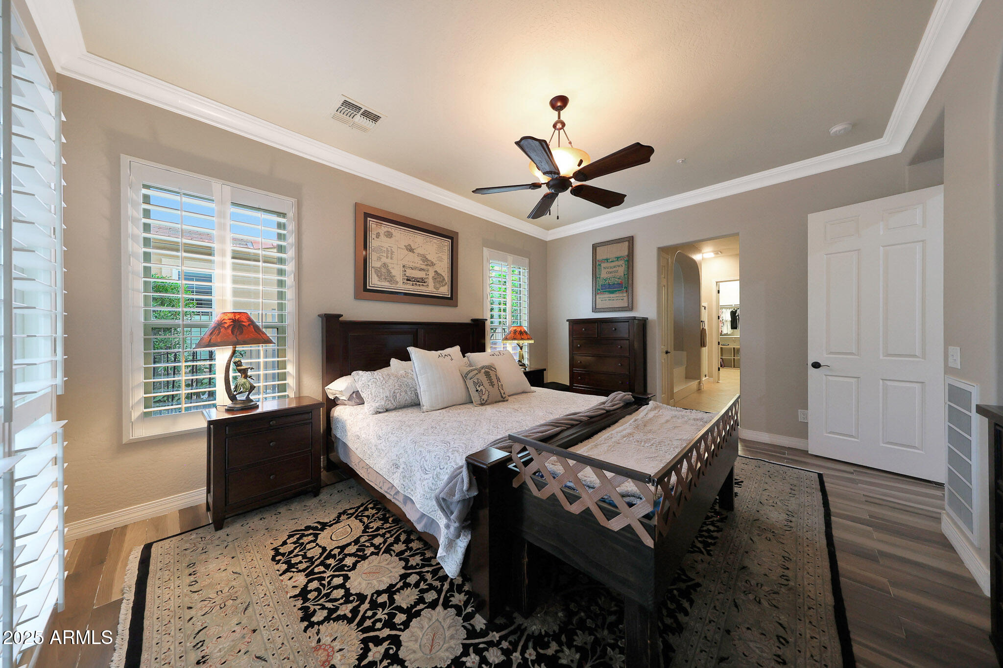 12920 West Roy Rogers Road Peoria, AZ 85383 - Photo 33 of 85 a bedroom with a bed next to a window with a flat screen tv