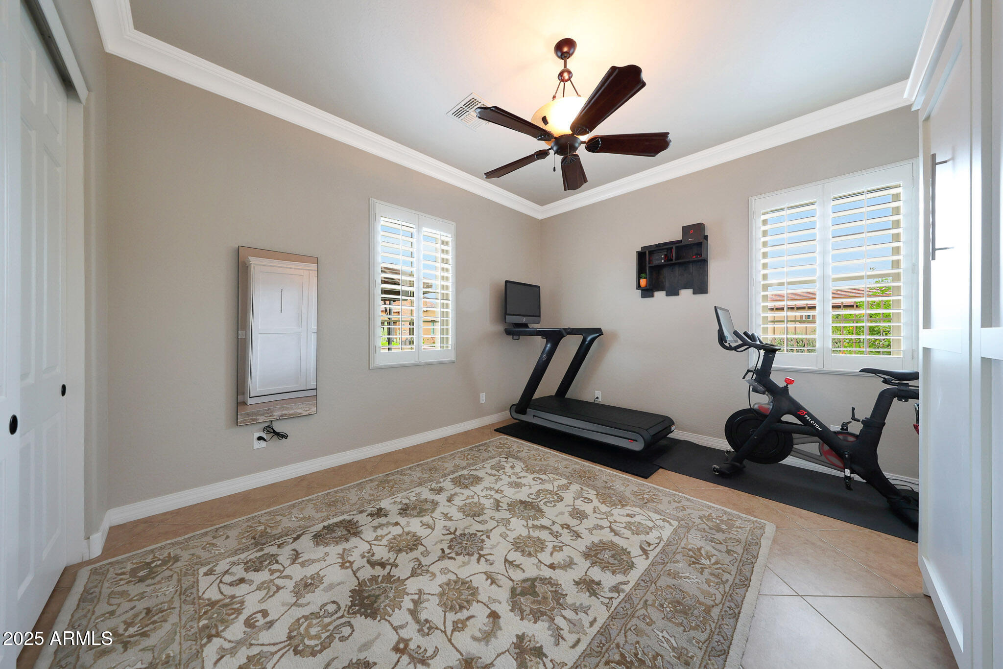 12920 West Roy Rogers Road Peoria, AZ 85383 - Photo 41 of 85 a bedroom with furniture and a window