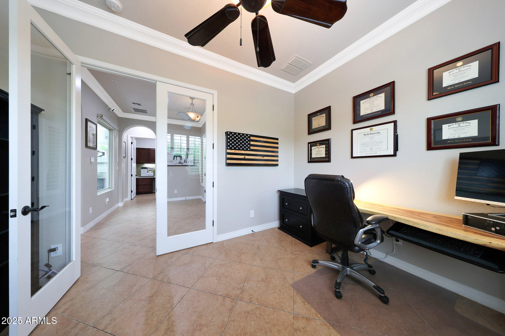 12920 West Roy Rogers Road Peoria, AZ 85383 - Photo 45 of 85 a view of a livingroom with workspace and a window