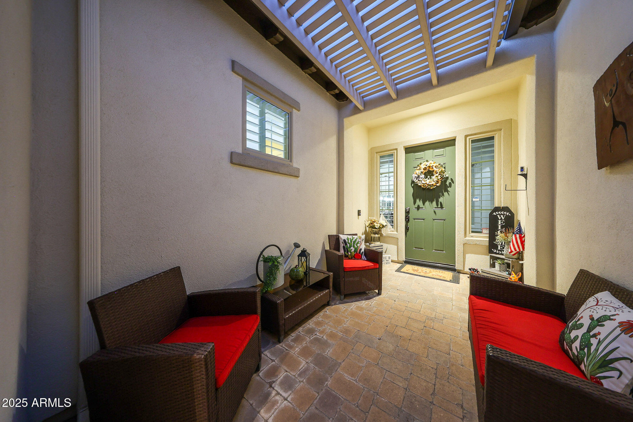 12920 West Roy Rogers Road Peoria, AZ 85383 - Photo 72 of 85 a living room with furniture and a potted plant