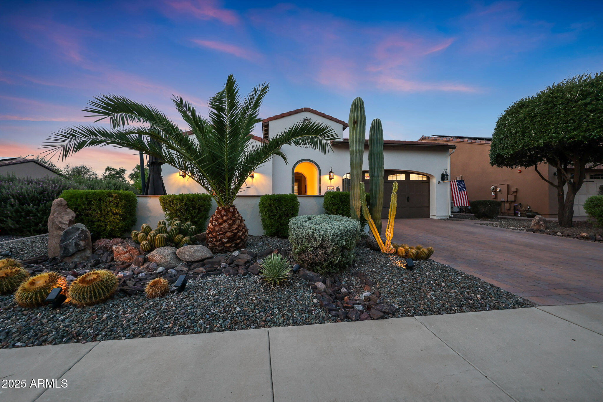 12920 West Roy Rogers Road Peoria, AZ 85383 - Photo 75 of 85 a front view of a house with garden