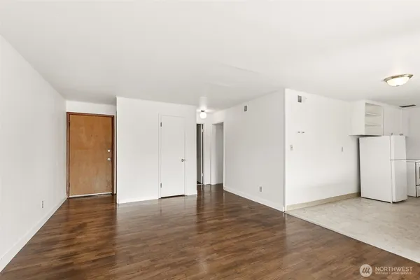 a view of a livingroom with wooden floor