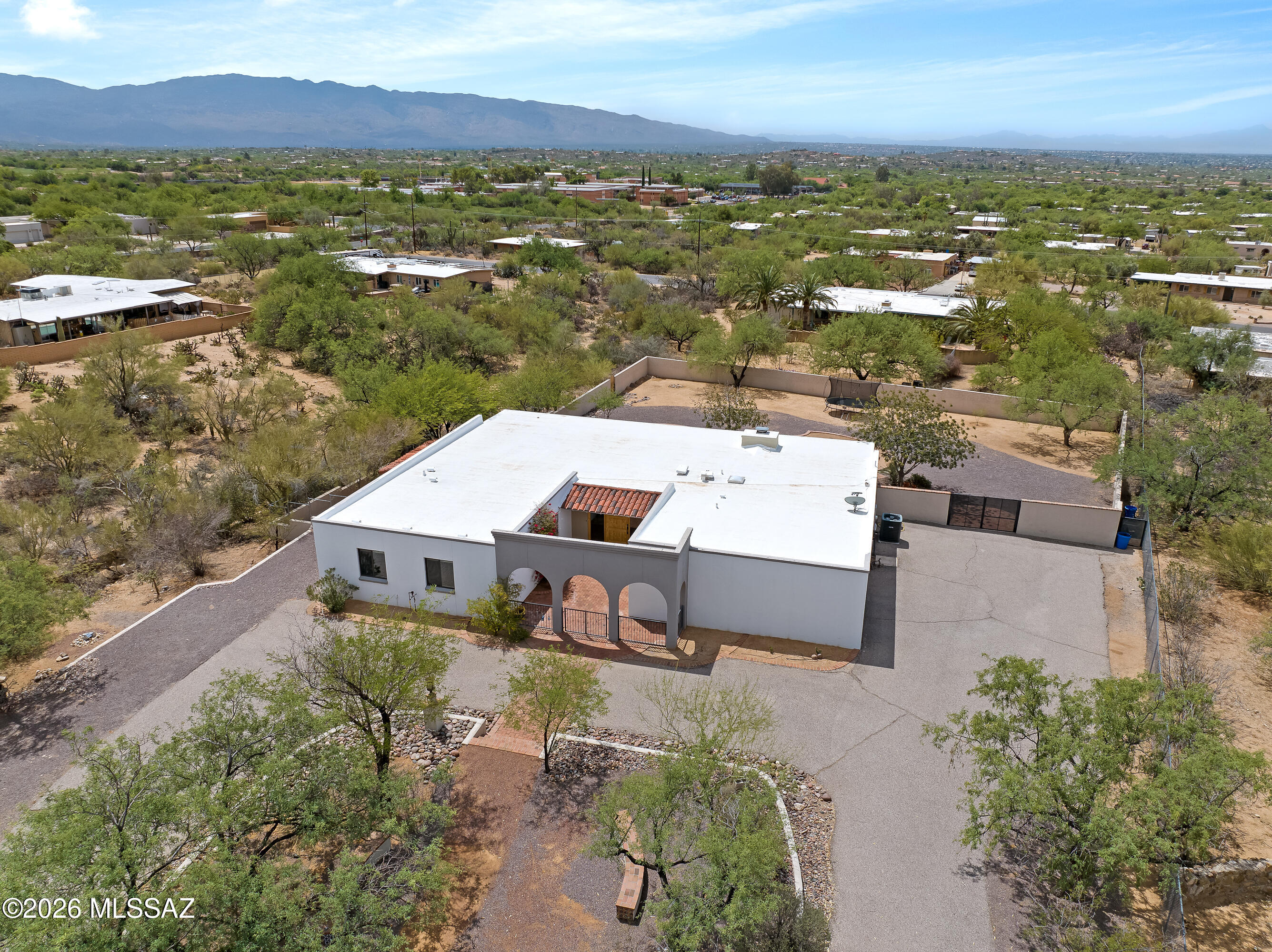 9420 East Ravine Trail Tucson, AZ 85749 - Photo 34 of 39 an aerial view of residential houses with outdoor space