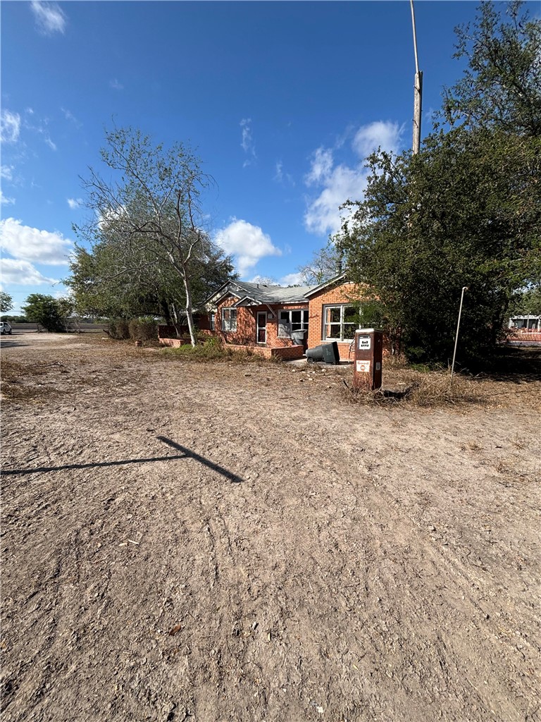 369 Edith Drive Alice, TX 78332 - Photo 8 of 27 a view of a street with a building in the background