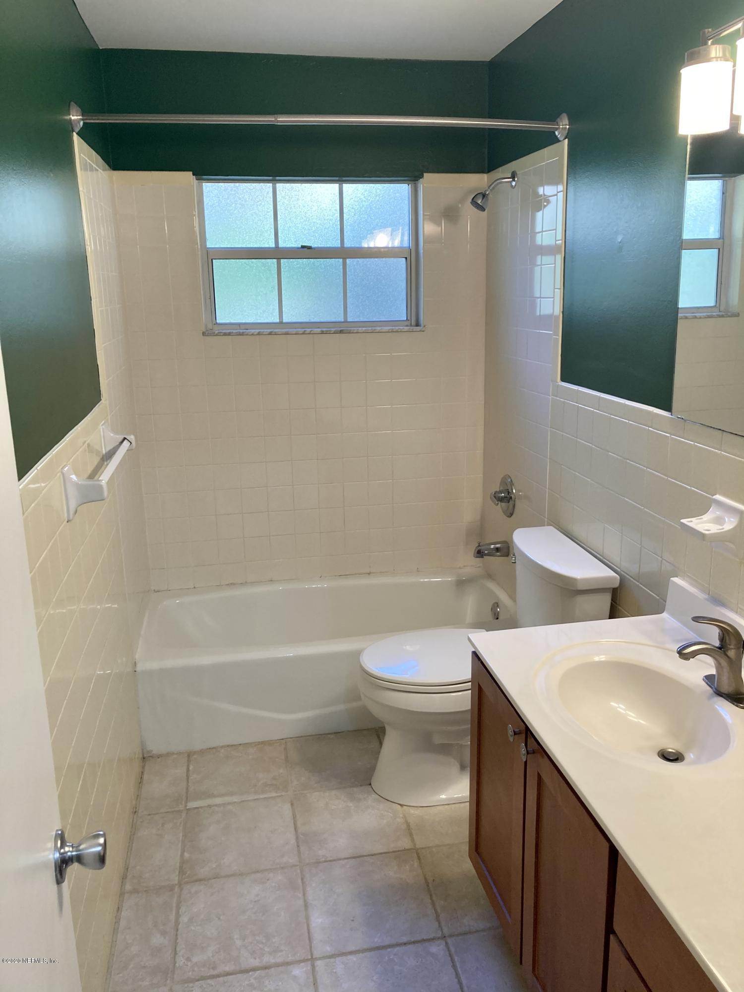 1371 Prince Road St. Augustine, FL 32086 - Photo 10 of 15 a bathroom with a toilet a sink and bathtub