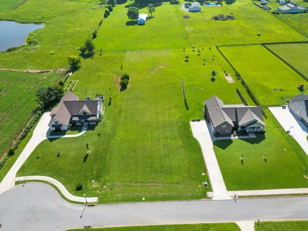 an aerial view of a residential houses
