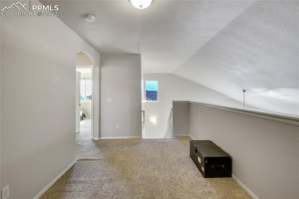 6446 Dancing Moon Way Colorado Springs, CO 80911 - Photo 19 of 42 a view of a livingroom with wooden floor