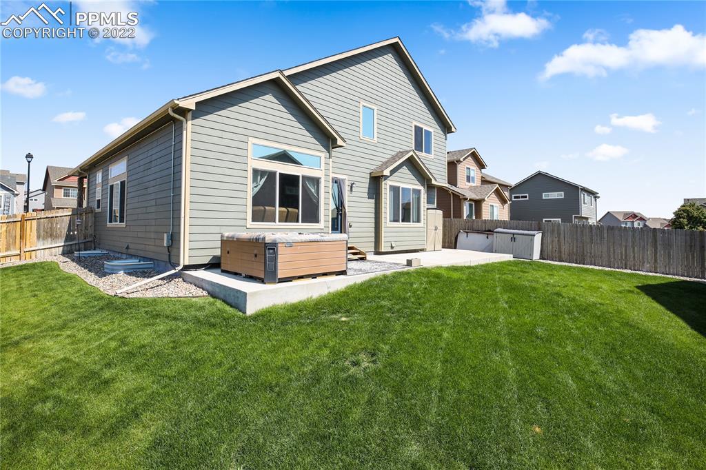 6446 Dancing Moon Way Colorado Springs, CO 80911 - Photo 33 of 42 a front view of house with yard and green space