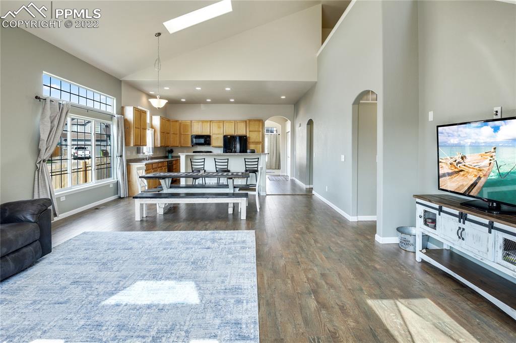 6446 Dancing Moon Way Colorado Springs, CO 80911 - Photo 8 of 42 a view of living room with furniture and flat screen tv