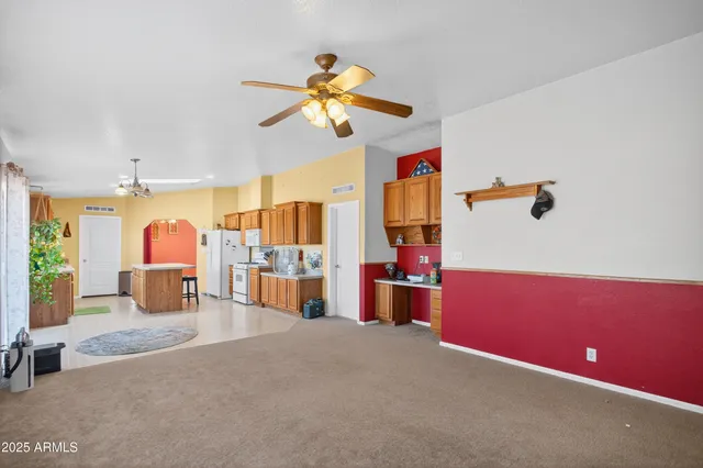a bed room with furniture and a chandelier