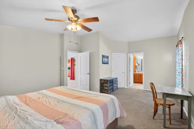 a bathroom with a shower toilet and sink