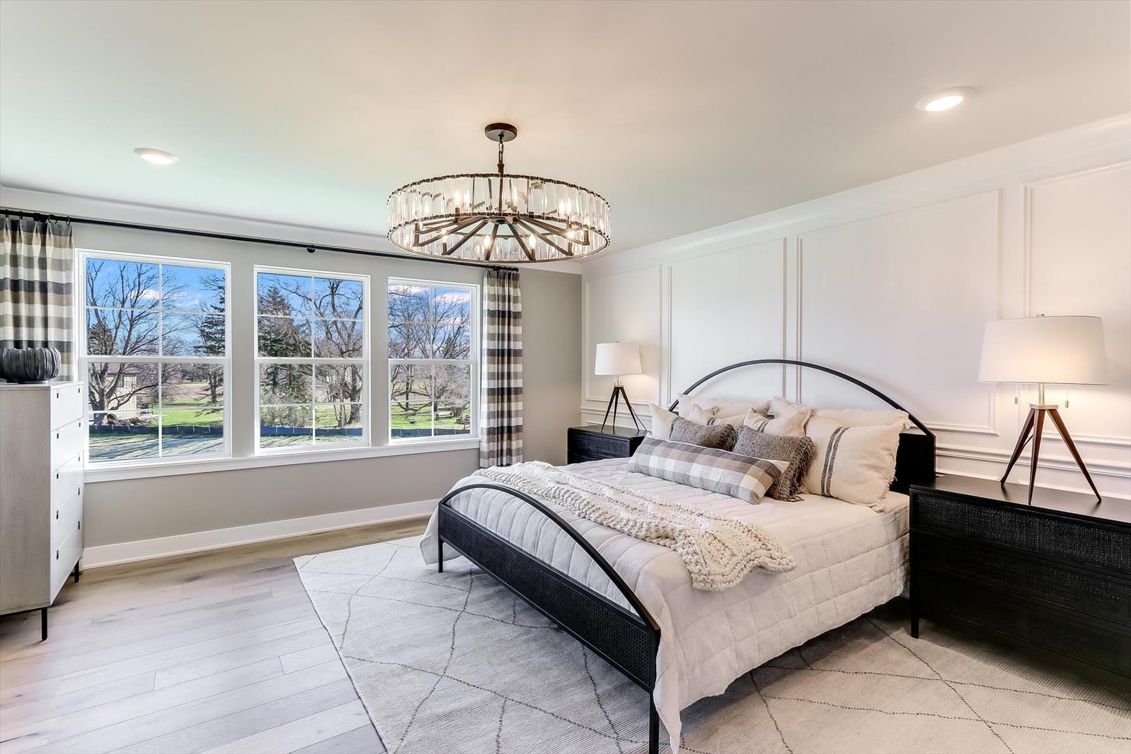 10733 Chadsey Road Huntley, IL 60142 - Photo 20 of 30 a bedroom with a large bed and a window