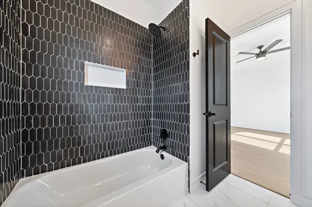 a bathroom with a bathtub