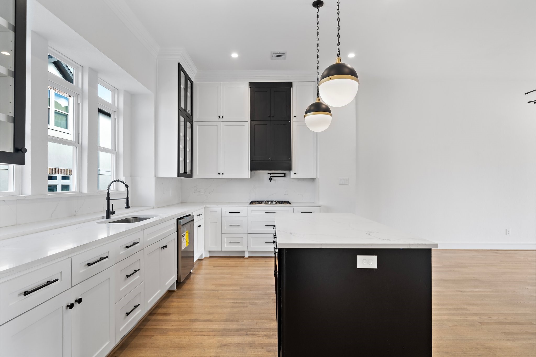 1005 East 28th Street Houston, TX 77009 - Photo 7 of 35 a bathroom with a sink vanity and a mirror