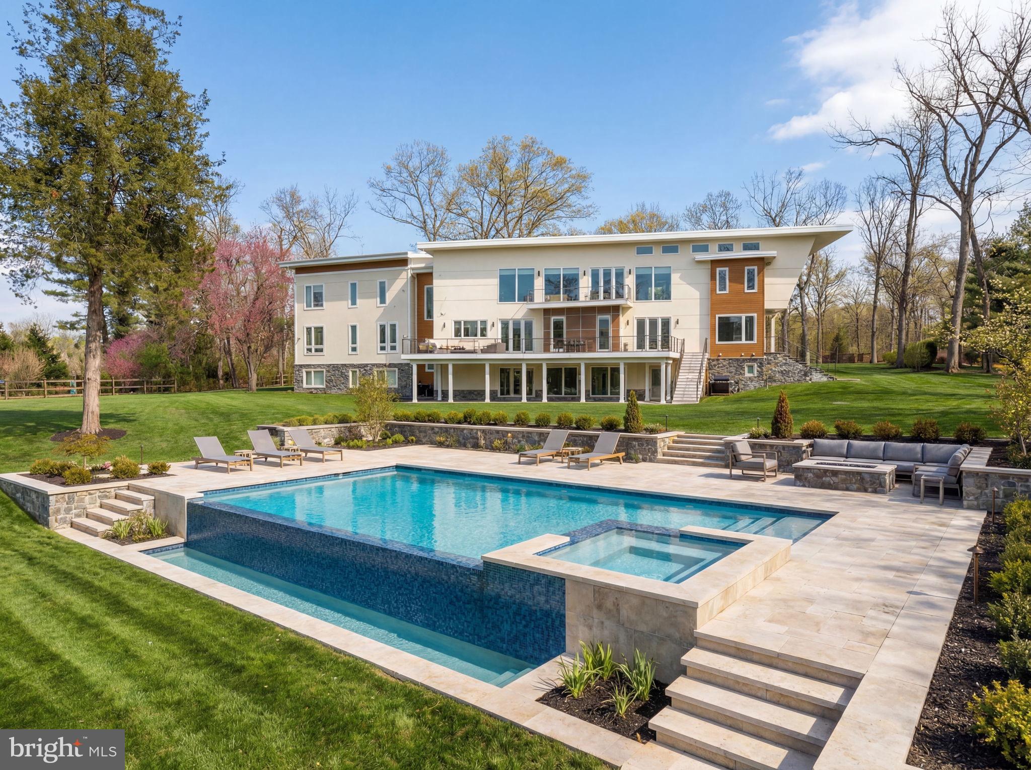 2368 Hunter Mill Road Vienna, VA 22181 - Photo 43 of 74 a view of a house with pool and chairs