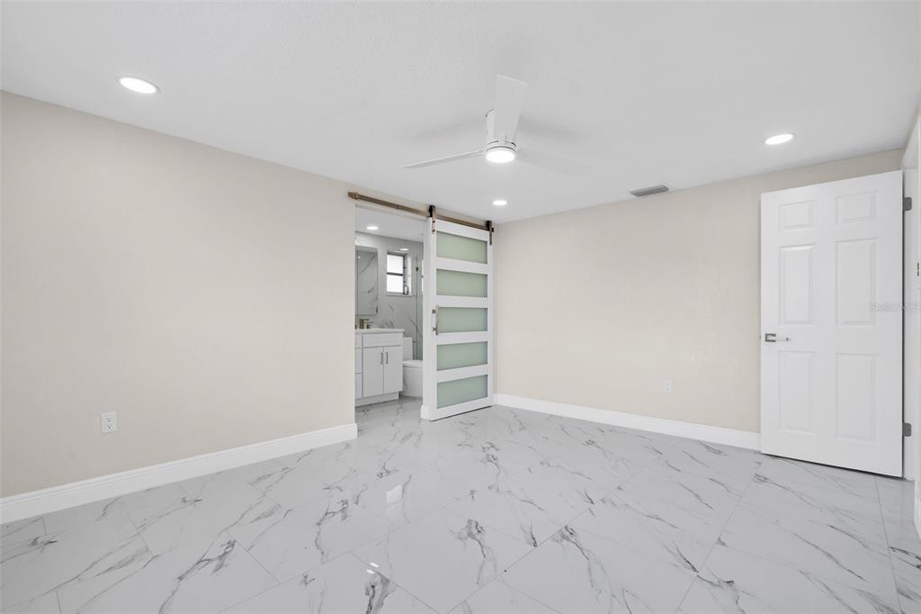 5626 Moog Road Holiday, FL 34690 - Photo 17 of 38 an empty room with a empty space