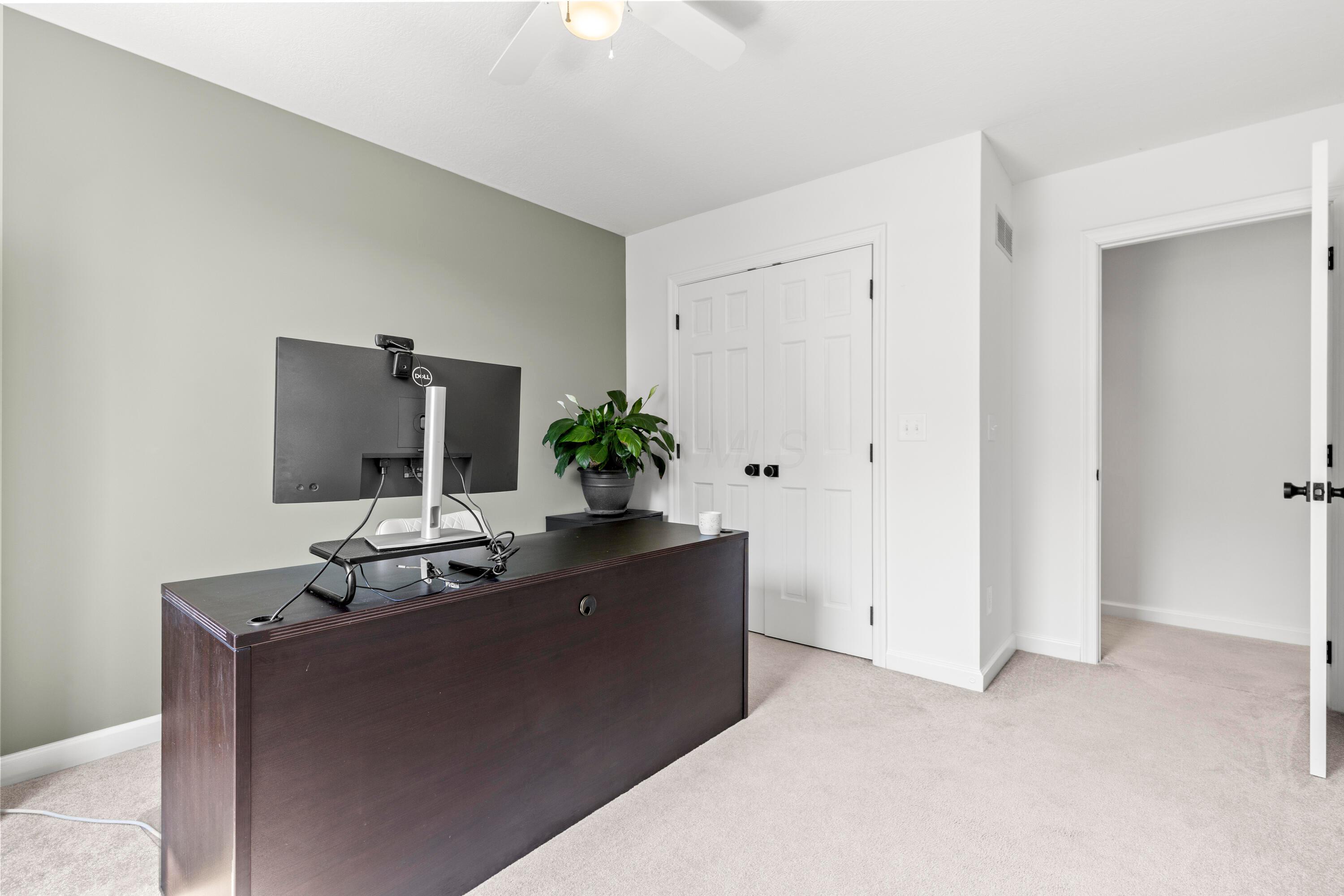 1515 Dale Ford Road Delaware, OH 43015 - Photo 45 of 74 • Light sand carpet • Ivory painted & sage accent wall • Lighted ceiling fan • Closet with (2) doors • Shades remain