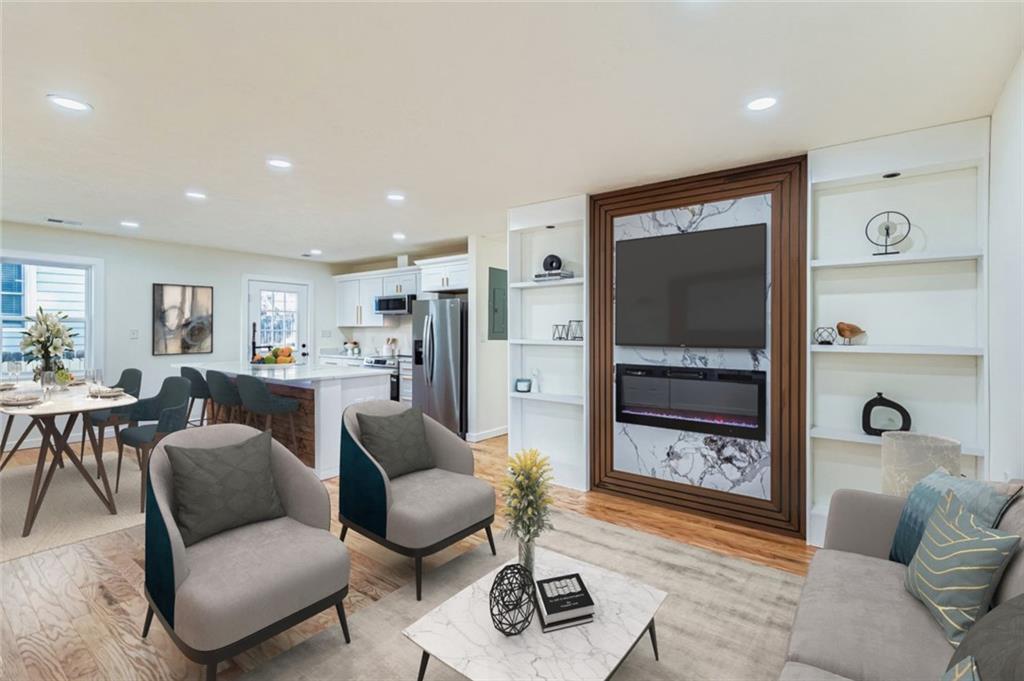 194 Dearborn Street Southeast Atlanta, GA 30317 - Photo 8 of 25 a living room with furniture and a table