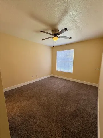 a bathroom with a sink a mirror and a toilet