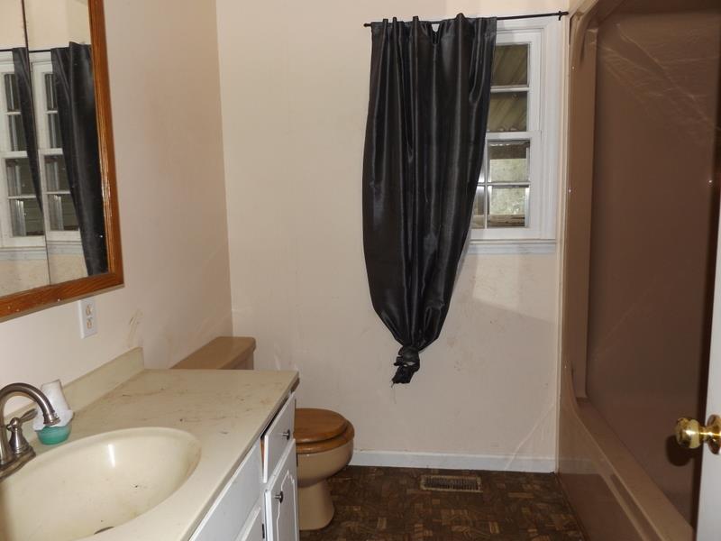 5560 Murfreesboro Road Lebanon, TN 37090 - Photo 11 of 20 a bathroom with a sink toilet and shower