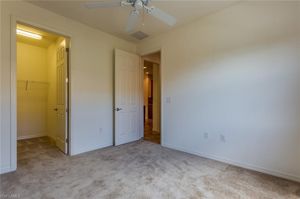 9037 Alturas Street, Unit 372 Naples, FL 34113 - Photo 16 of 23 an empty room with a bathroom