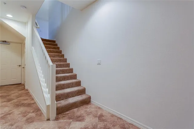 a view of an entryway with stairs