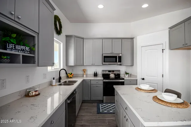 a dining room with furniture and wooden floor